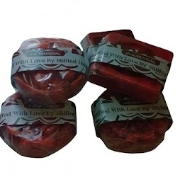 Gift box with artisan soap and pouch tied in ribbon